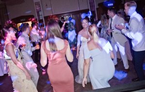 Bride and her friend having a great time on the dance floor- Pelham House 